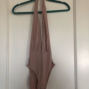 Out From Under dramatic v neck bodysuit